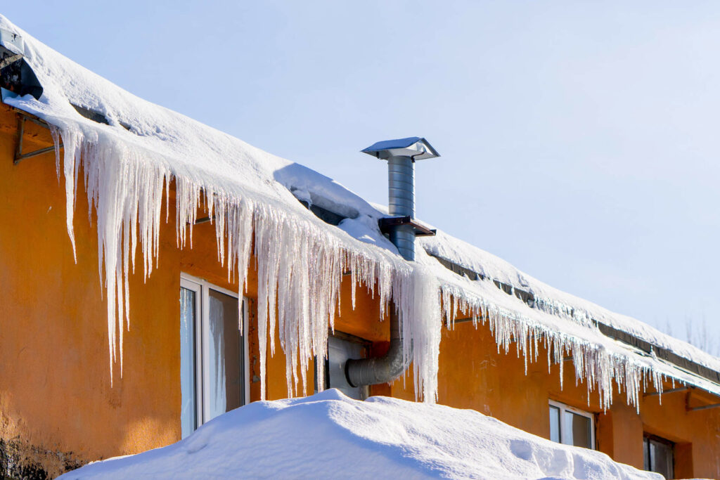 What Do Snow & Ice Do to Rain Gutters?