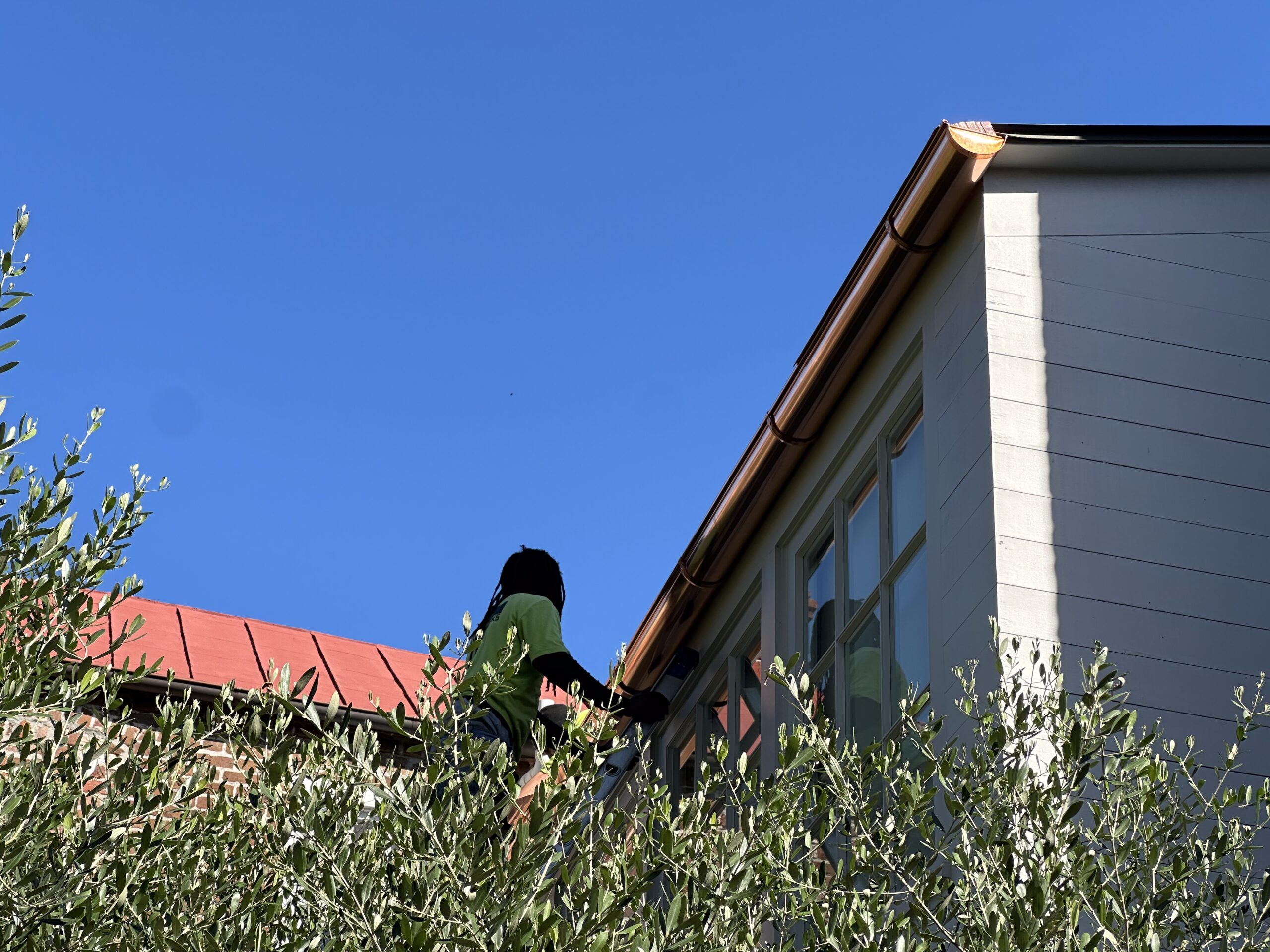 Charleston gutter company repairing gutters on Charleston home
